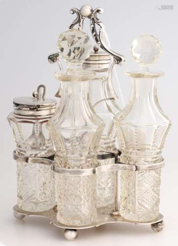 AN EDWARD VII SILVER CRUET FRAME AND SET OF CONTEMPORARY SILVER MOUNTED AND OTHER CUT GLASS