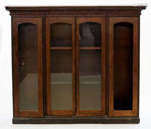 A VICTORIAN CARVED MAHOGANY BREAKFRONT BOOKCASE, 121CM H; 147 X 31CM Numerous scuffs, scratches