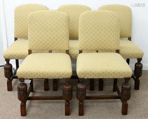 A SET OF FIVE OAK DINING CHAIRS, C1930 THE CLOSE NAILED PADDED BACK IN TRELLIS UPHOLSTERY WITH