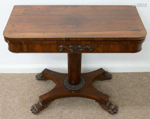 AN EARLY VICTORIAN ROSEWOOD CARD TABLE, THE FOLD-OVER TOP ON TAPERED PILLAR, CALYX AND PLATFORM,