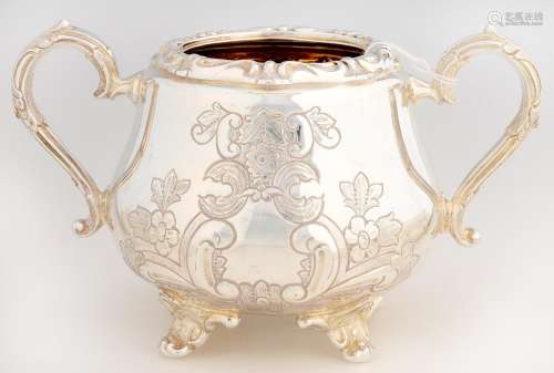 AN ELIZABETH II SILVER SUGAR BOWL OF HEAVY GAUGE, IN VICTORIAN STYLE, CHASED WITH FLOWERS AND 'C'