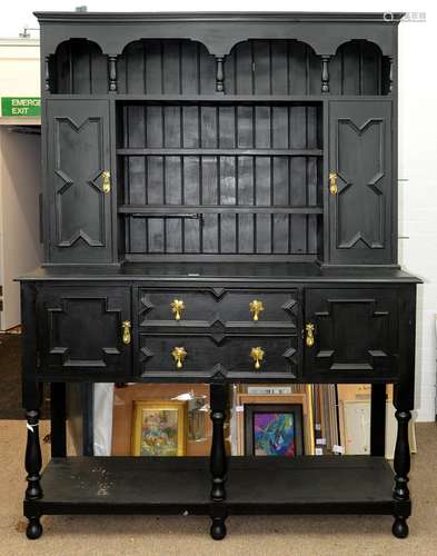 A GEOMETRICALLY MOULDED OAK DRESSER, EARLY 20TH C IN JACOBEAN STYLE WITH BRASS DROP HANDLES, LATER