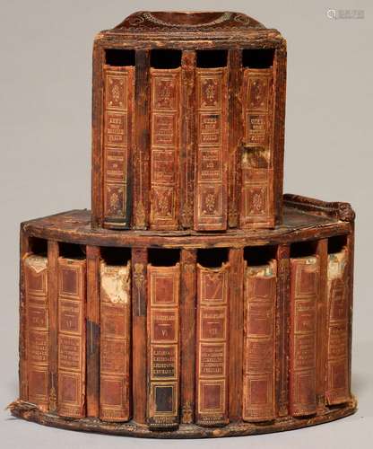 A VICTORIAN BOW FRONTED TOOLED LEATHER COVERED WOOD TABLE TOP BOOKCASE, THE TWELVE ORIGINAL