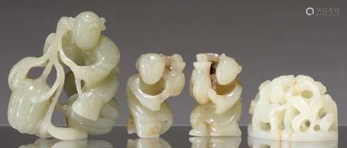 THREE CHINESE GREEN HARDSTONE CARVINGS OF BOYS, 54MM H AND SMALLER AND ANOTHER STONE CARVING OF DEER