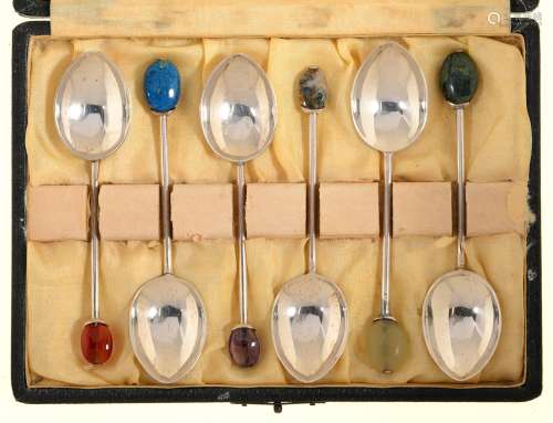 LIBERTY & CO. A SET OF SIX SILVER COFFEE SPOONS, EACH WITH DIFFERENT STONE TERMINAL, MARK OF LIBERTY