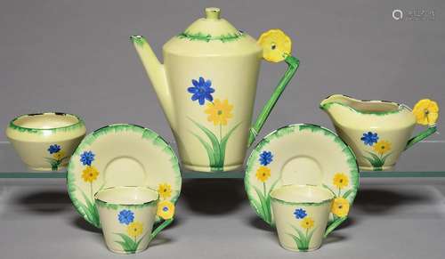 AN ART DECO EARTHENWARE COFFEE SERVICE, EMPIRE PORCELAIN CO, C1930, WITH FLOWER SHAPED HANDLE AND