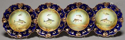 A SET OF FOUR AYNSLEY COBALT GROUND ICHTHYOLOGICAL PLATES, C1910, DECORATED AFTER R J KEELING,