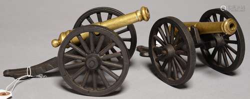 A PAIR OF BRASS MODEL CANNON, ON IRON CARRIAGE, BARREL 13CM L Good condition