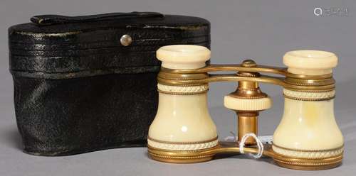 A PAIR OF FRENCH GILT BRASS AND TURNED IVORY OPERA GLASSES, C1900, WITH BEADED DECORATION, SILK