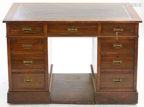 AN OAK PEDESTAL DESK WITH BROWN LEATHER TOP, EARLY 20TH C, 78CM H; 122 X 67CM Scuffs and scratches