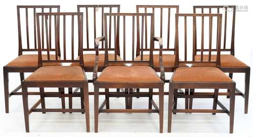 A SET OF SEVEN MAHOGANY DINING CHAIRS, INCLUDING ONE ELBOW CHAIR, ON SQUARE TAPERING LEGS, EARLY