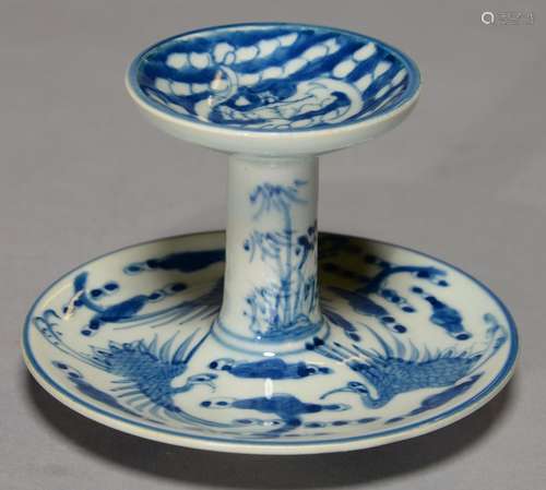 A CHINESE BLUE AND WHITE STAND, PAINTED WITH PHOENIX AND LINGZHI, THE UNDERSIDE WITH SHOU