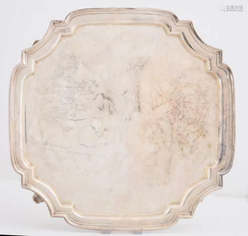 A GEORGE V SILVER SALVER, SHAPED SQUARE, ON FOUR VOLUTE FEET, 30.5 X 30.5CM, BY S BLANCKENSEE & SONS