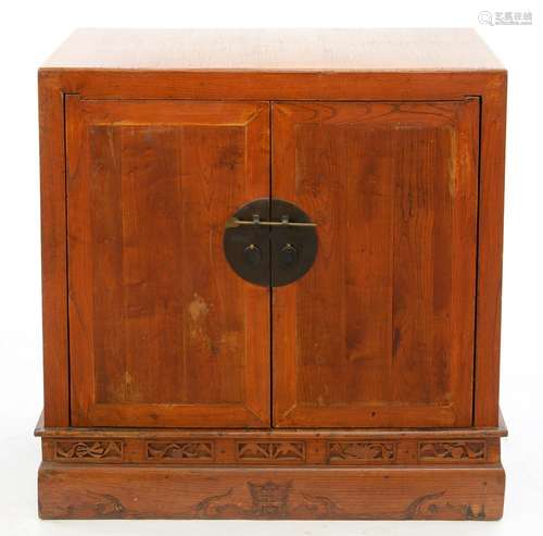 A KOREAN ELM CUPBOARD MOUNTED WITH BRASS HANDLES AND LOCK, EARLY 20TH C, 91CM H; 89 X 57CM Splits to