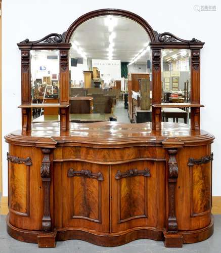 A VICTORIAN MAHOGANY SERPENTINE MIRROR BACKED SIDEBOARD, THE LOWER PART ENCLOSED BY PANELLED