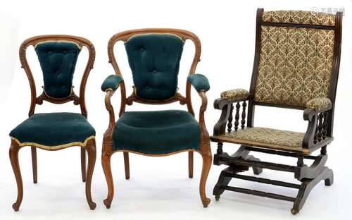 A VICTORIAN CARVED OAK OPENWORK ELBOW CHAIR AND A DINING CHAIR EN SUITE AND A BEECH AMERICAN ROCKING