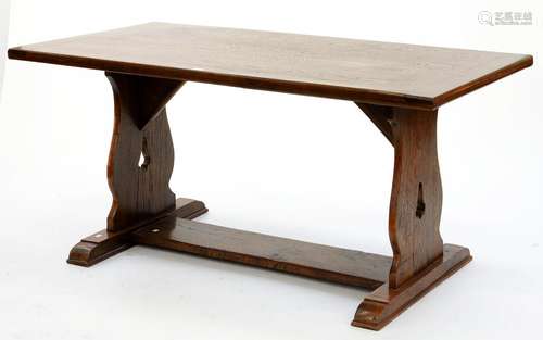 AN OAK DINING TABLE, THE TOP WITH CLEATED ENDS ON TRESTLE AND STRETCHER BASE, 76CM H; 160 X 84CM Top