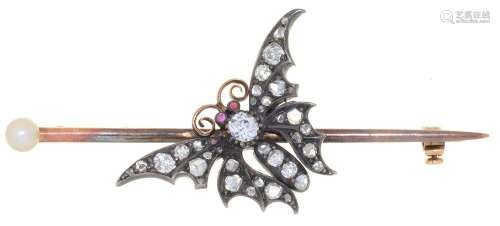 A DIAMOND BUTTERFLY BROOCH, C1900, WITH RUBY CABOCHON EYES, MOUNTED ON A GOLD PIN WITH CULTURED