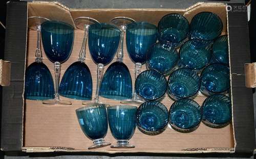 A SUITE OF BLUE GLASS, COMPRISING SIX GOBLETS AND THIRTEEN WATER GLASSES, 20TH C, THE LATTER