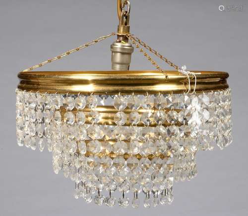 A GILTMETAL AND GLASS CONCENTRIC CASCADE CHANDELIER, 20TH C, 27CM DIA Basically complete and in good