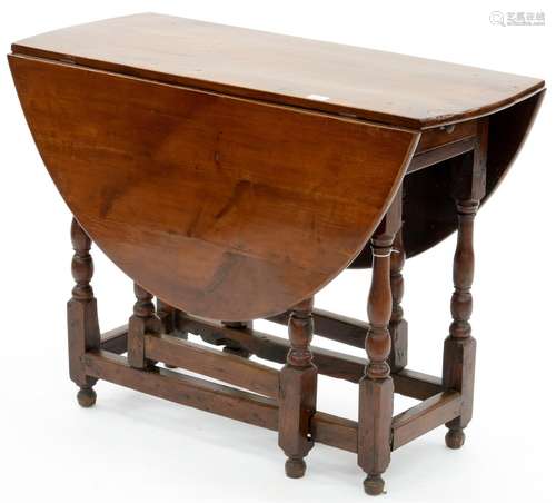 A YEW WOOD GATELEG TABLE, 74CM H; 101 X 130CM Chips and losses to base, small split to top