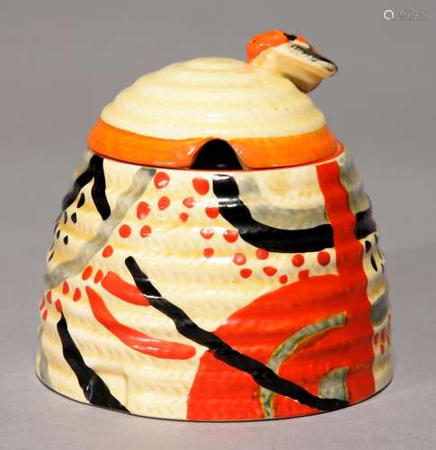 CLARICE CLIFF. AN A J WILKINSON CARPET BEE SKEP HONEY JAR AND COVER, 1930, 9CM H, PRINTED BIZARRE