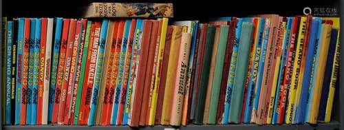 FOUR SHELVES OF MISCELLANEOUS CHILDREN’S ANNUALS, INCLUDING RUPERT, DANDY, BEANO, DR WHO AND OTHERS