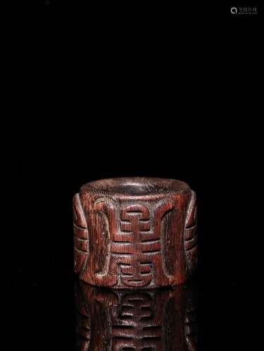 A Chinese Agarwood Thumb Ring With Pattern