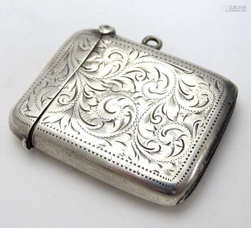 A silver vesta case with engraved decoration. Hallmarked Birmingham 1904 maker Joseph Gloster 2