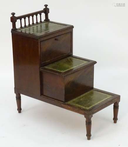 A 19thC mahogany step commode /set of library steps with three gold tooled leather tiers and a