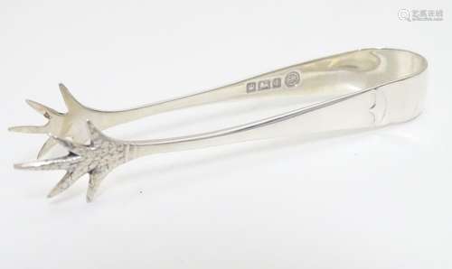 Silver sugar tongs / nips with bird?s claw formed grips. Hallmarked Sheffield 1911 maker Francis