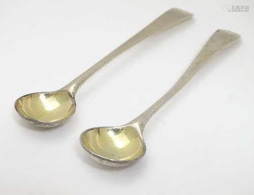 A pair of silver salt spoons with gilded bowls. hallmarked London 1827 maker RC. 4