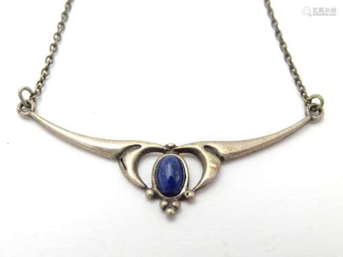 A silver necklace set with blue stone cabochon in the Art Nouveau style Approx 16