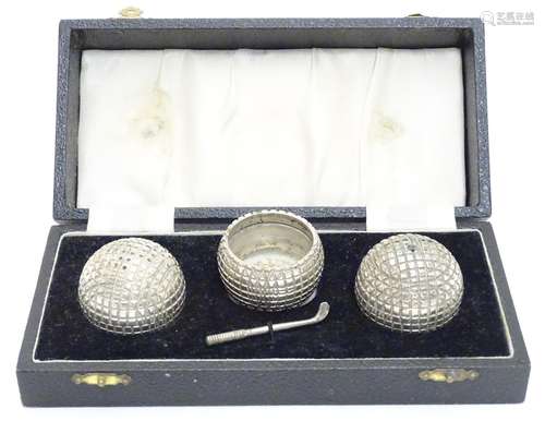 A novelty 3 piece silver plat cruet set comprising salt, pepper and mustard pots formed as gold