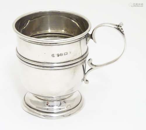 A silver Christening mug. Hallmarked Birmingham 1924 maker William Suckling Ltd. Approx 3