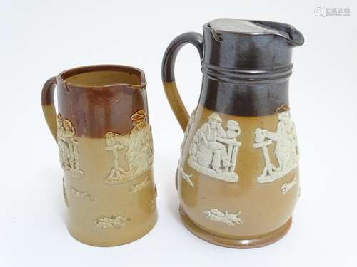 A Royal Doulton and Doulton Lambeth two tone stoneware jugs decorated with hunting scenes in relief.