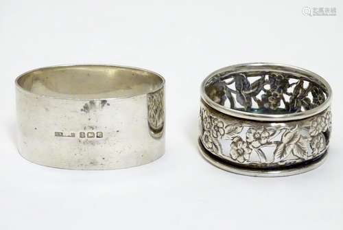 A silver napkin ring hallmarked Birmingham 1935 maker S Blanckensee & Son Ltd, together with another