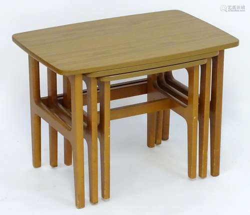 Vintage Retro, Mid-Century: a teak nest of three tables by Schreiber, the largest 27 1/2