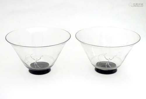 A pair of Art Deco glass dessert bowls in the manner of Orrefors, of tapering form with black