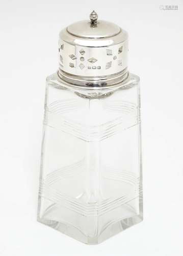 An Art Deco sugar caster / dredger, the squared glass body with banded detail and top hallmarked