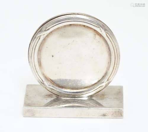 A silver plate table menu / place card holder of circular form by James Dixon & Son. marked under