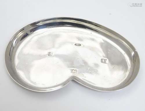 A silver dish of shaped form hallmarked Birmingham 1982 maker Albert Edward Jones. Approx 5 1/4