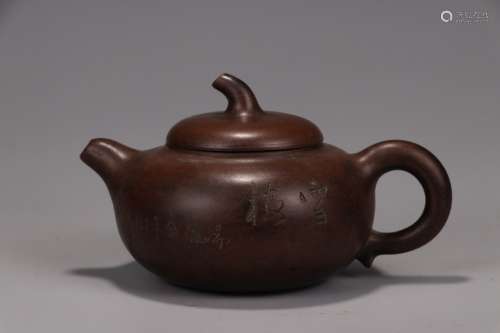 A Chinese Zisha Teapot With Plum Flower Pattern