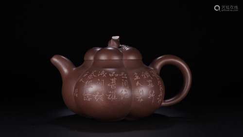 A Chinese Zisha Teapot Of Poetry
