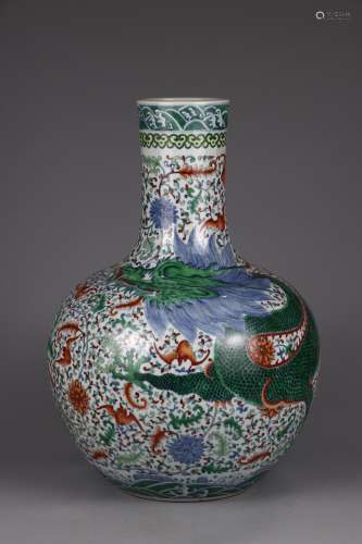 A Chinese Porcelain Doucai Dragon Bottle Vase