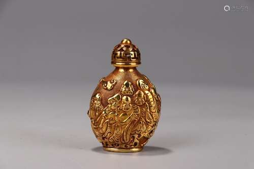 A Chinese Gilt Bronze Arhat Carving Snuff Bottle