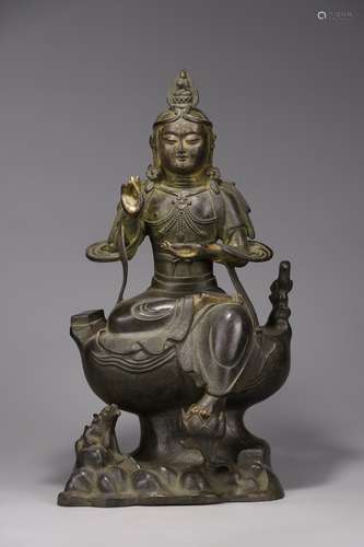 A Chinese Bronze Guanyin Statue