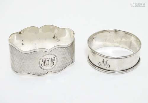 A silver napkin ring with engine turned decoration, hallmarked Chester 1925 maker S Blanckensee &