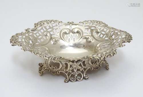 A Victorian silver bon bon dish with embossed and pierced decoration hallmarked Birmingham 1893. 5