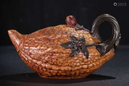 A Chinese Zisha Teapot Of Pumpkin Shaped